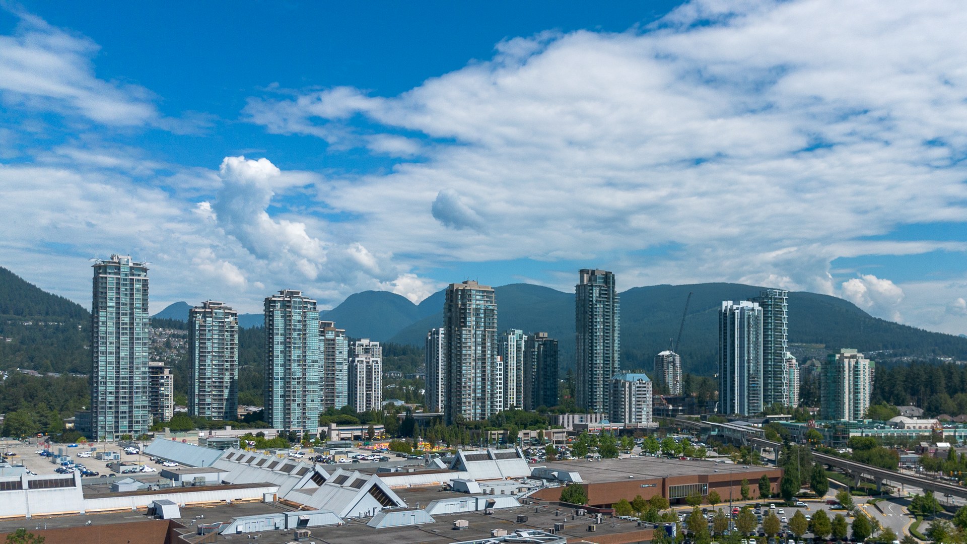 Coquitlam Town Centre towers beside Lafarge Lake